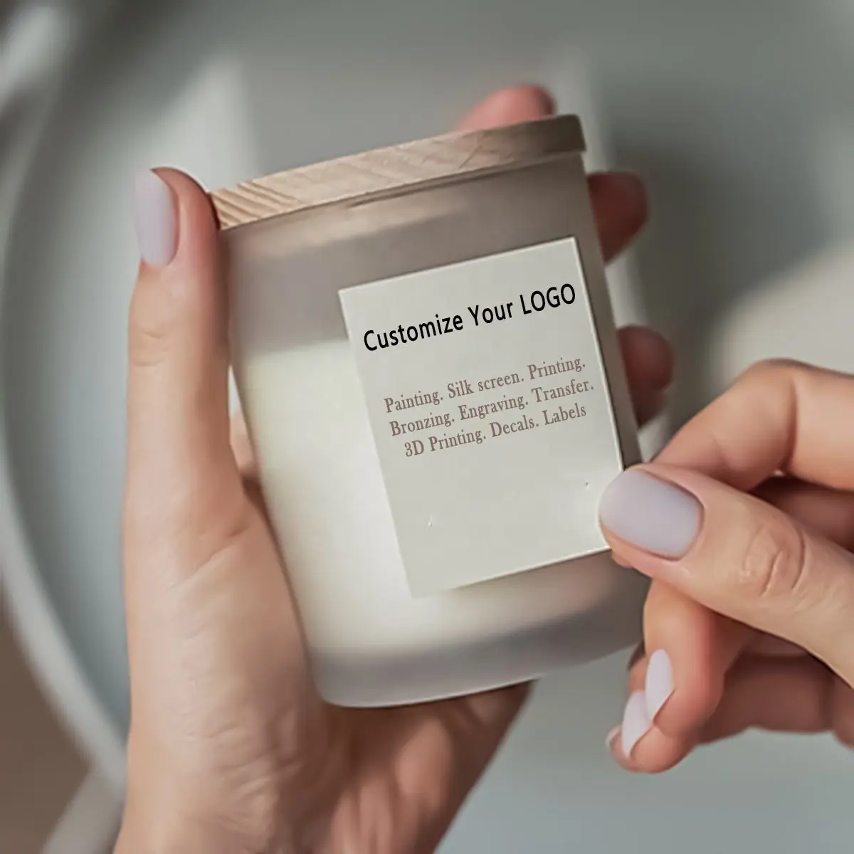 Custom logo on a frosted candle jar