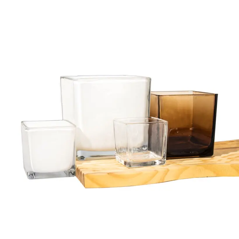 Square cube glass candle jars in clear, white and amber